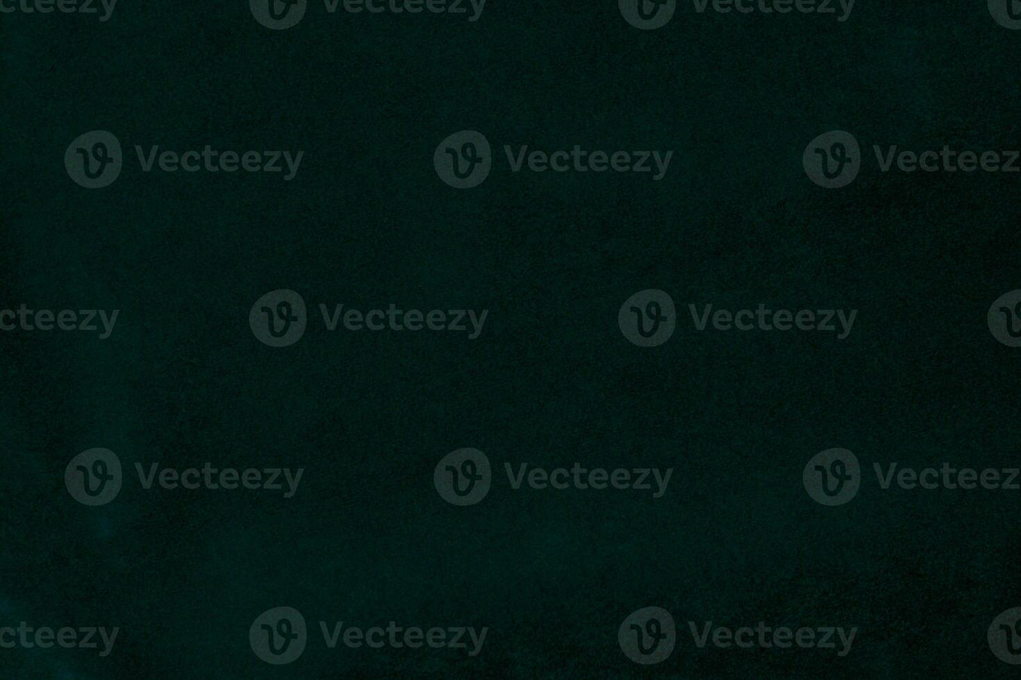 Green velvet fabric texture used as background. green fabric background of soft and smooth textile material. There is space for text. photo