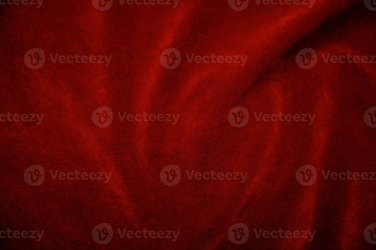 Red velvet fabric texture used as background. red fabric background of soft and smooth textile material. There is space for text.. photo