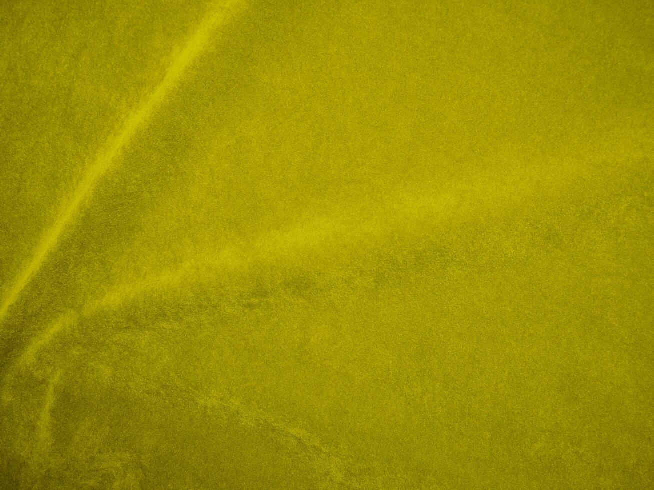 Orange velvet fabric texture used as background. orange fabric background of soft and smooth textile material. There is space for text. photo