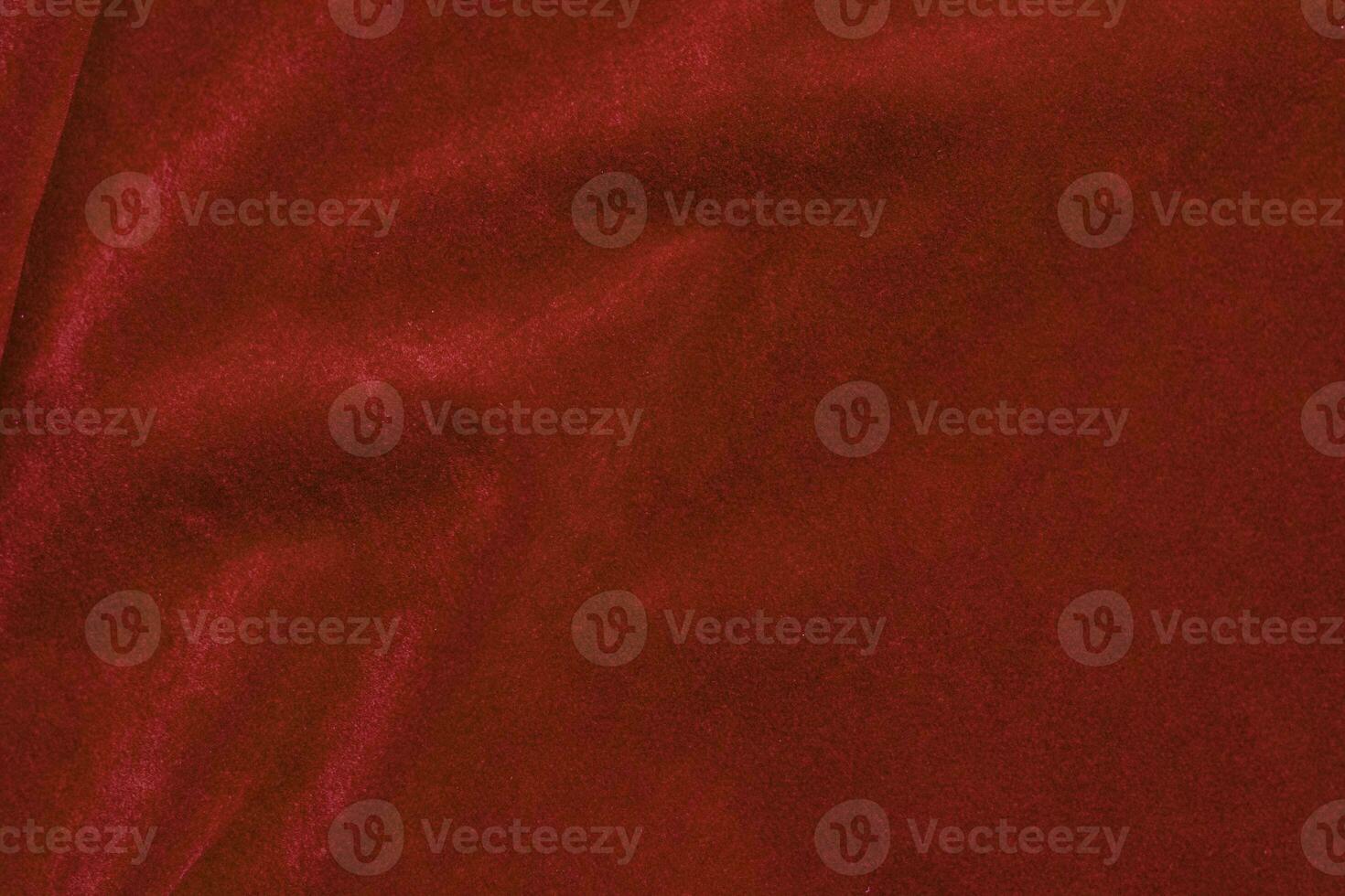 Red velvet fabric texture used as background. red fabric background of soft and smooth textile material. There is space for text. photo