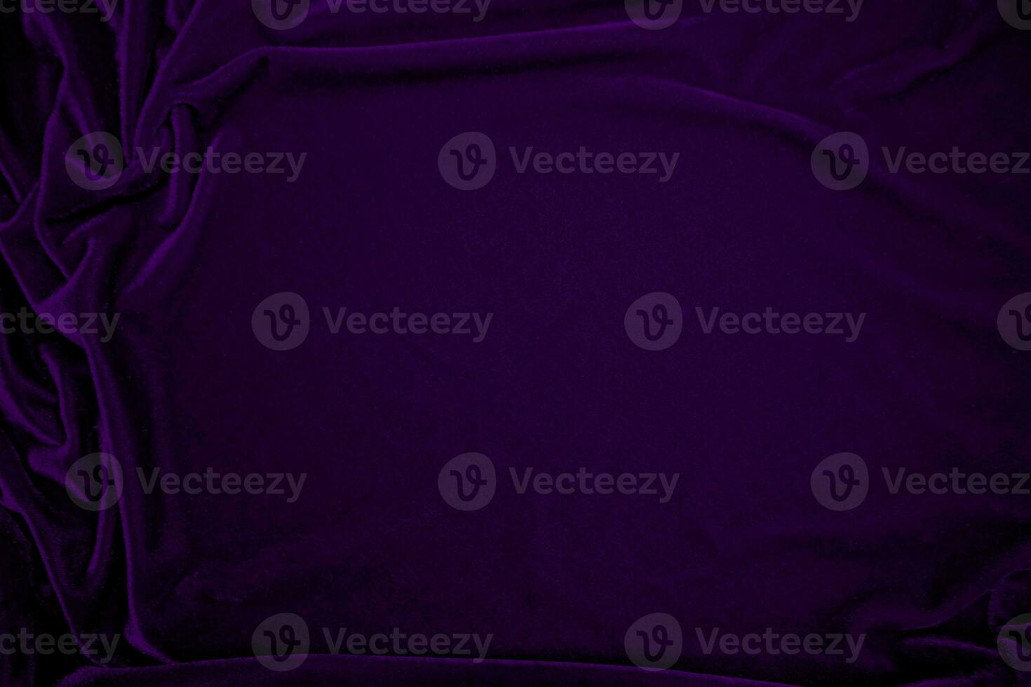 Purple velvet fabric texture used as background. Violet color panne fabric background of soft and smooth textile material. crushed velvet .luxury magenta tone for silk. photo