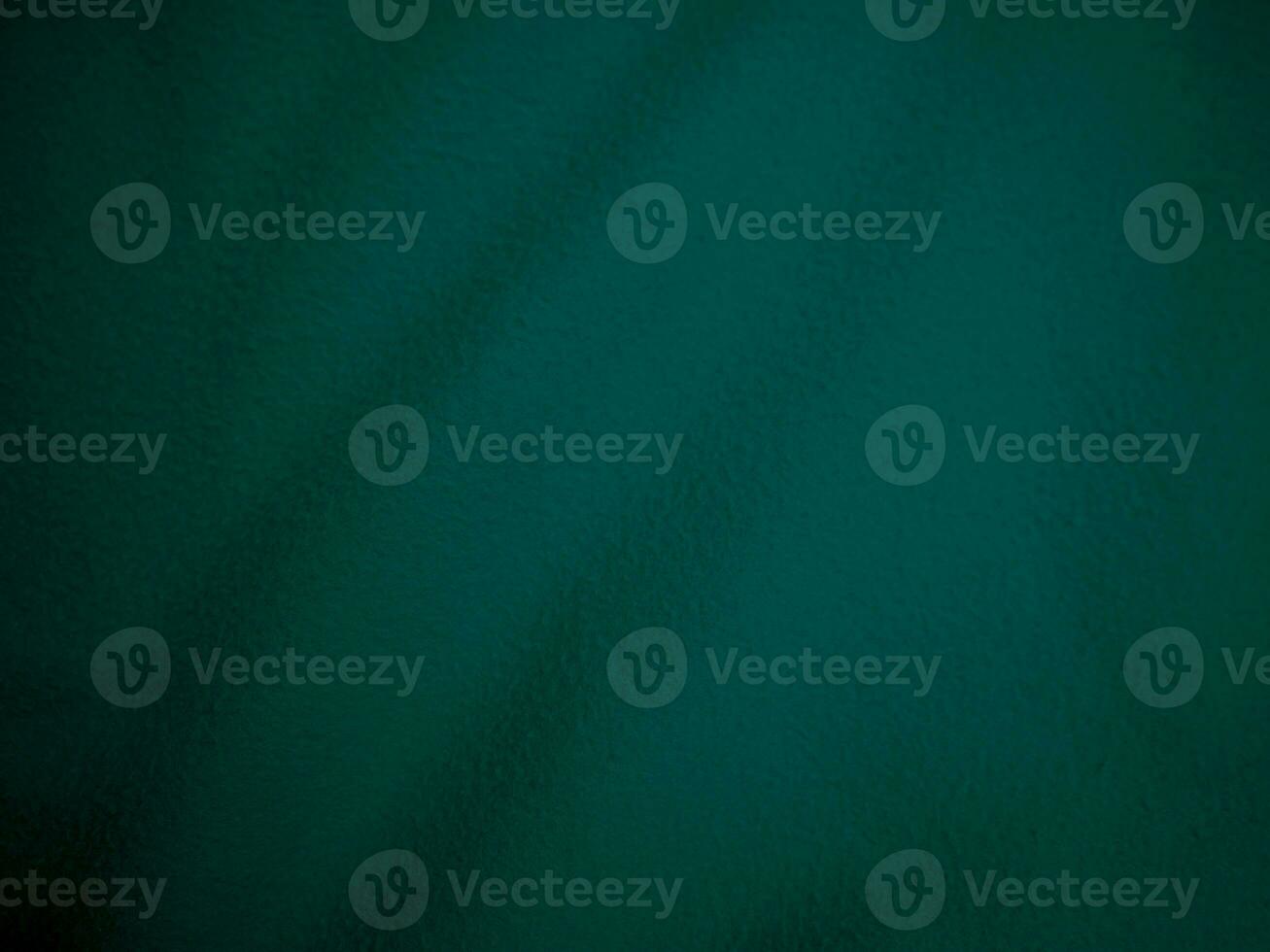 Green clean wool texture background. light natural sheep wool. serge seamless cotton. texture of fluffy fur for designers. close up fragment green flannel haircloth carpet broadcloth. photo