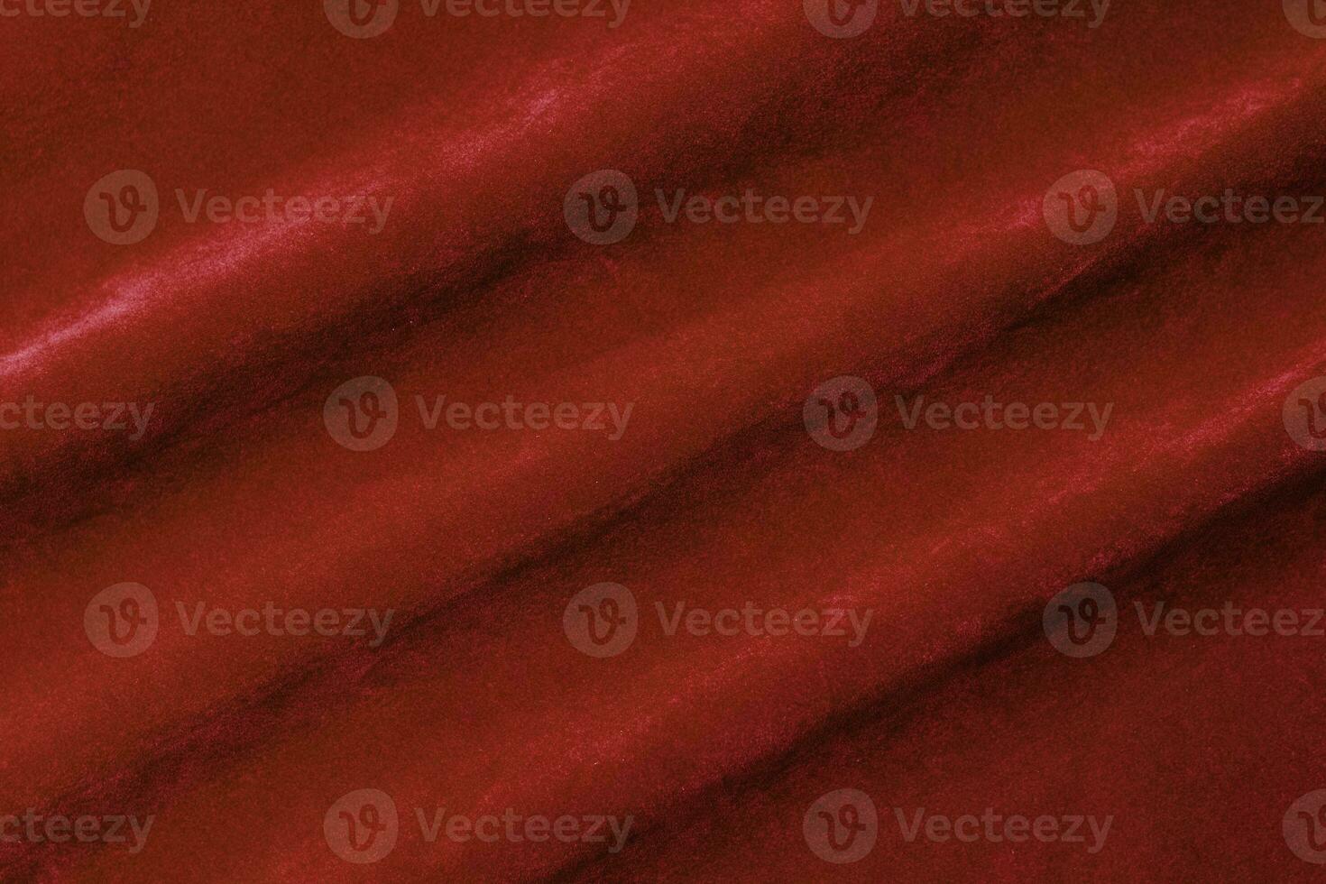 Red velvet fabric texture used as background. red fabric background of soft and smooth textile material. There is space for text. photo