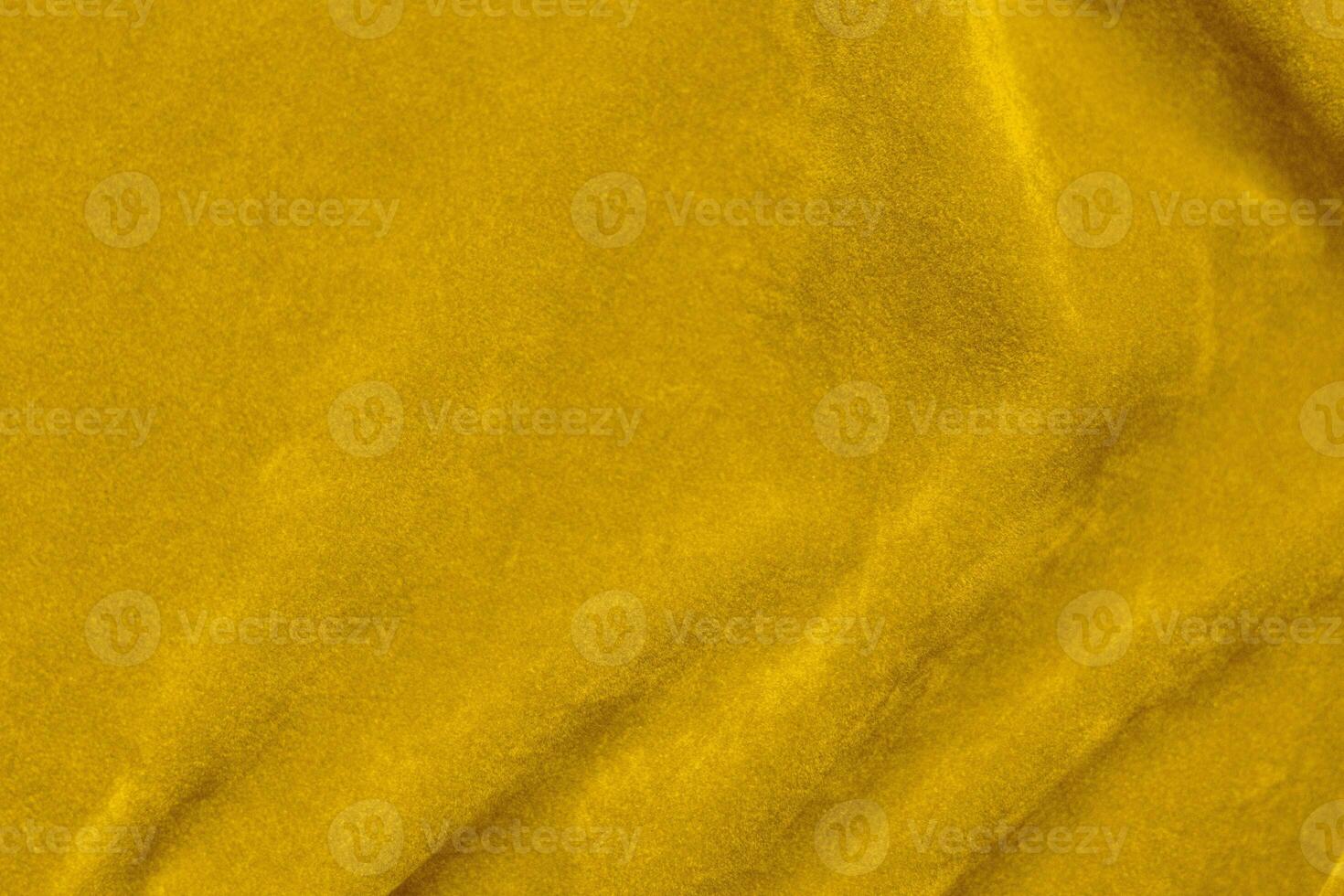 Yellow velvet fabric texture used as background. violet fabric background of soft and smooth textile material. There is space for text. photo