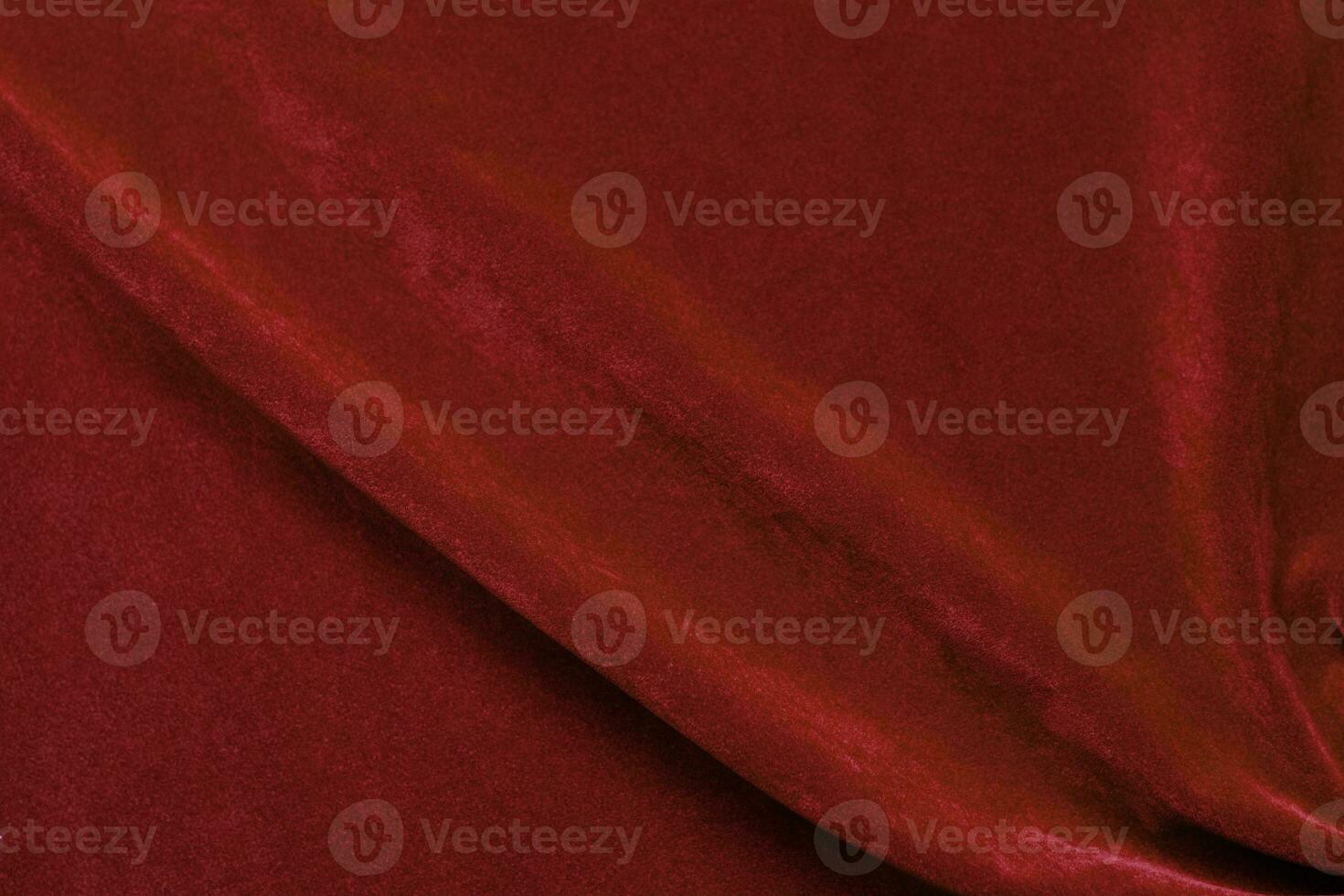 Red velvet fabric texture used as background. red fabric background of soft and smooth textile material. There is space for text. photo