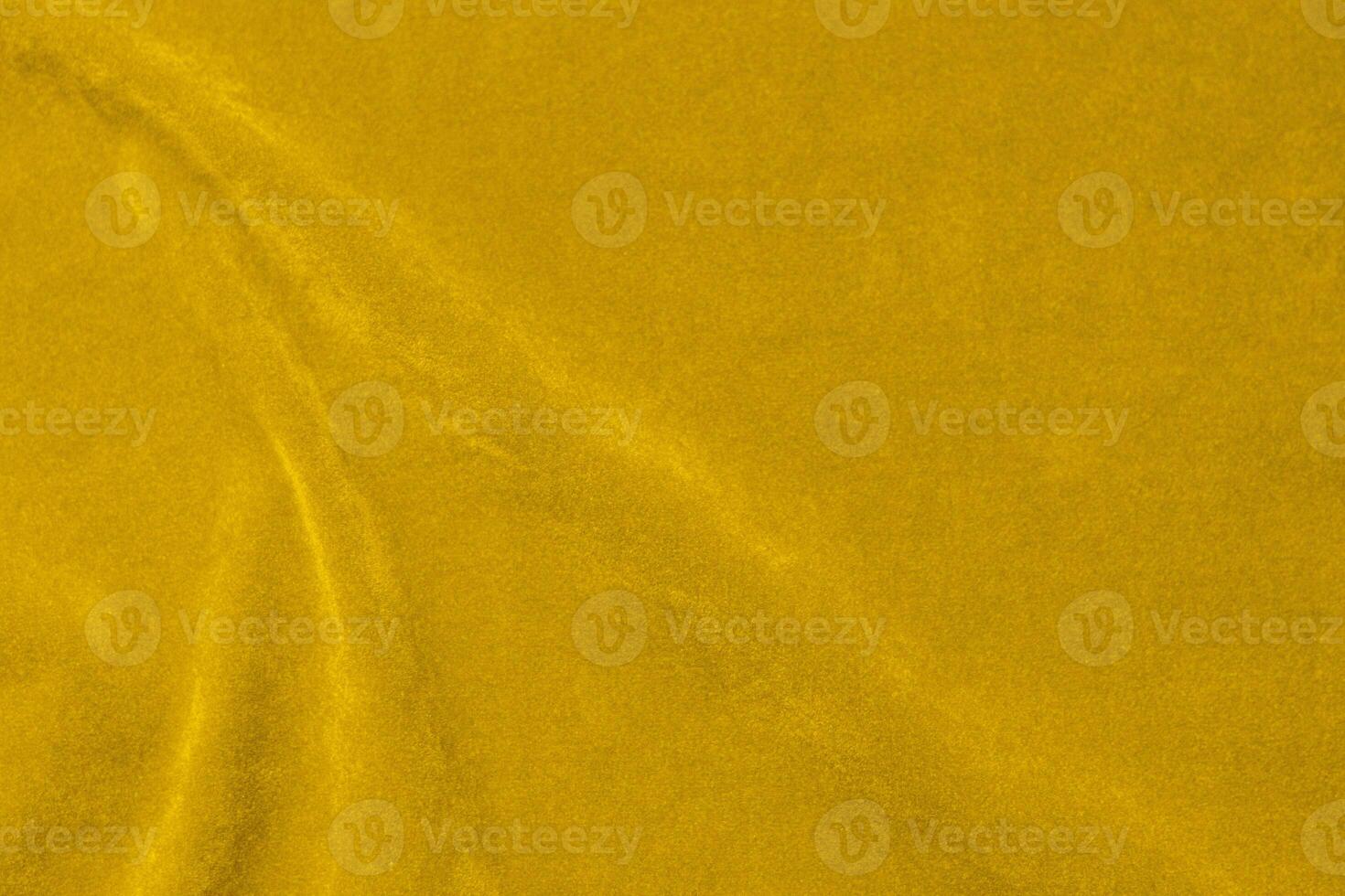 Yellow velvet fabric texture used as background. violet fabric background of soft and smooth textile material. There is space for text. photo