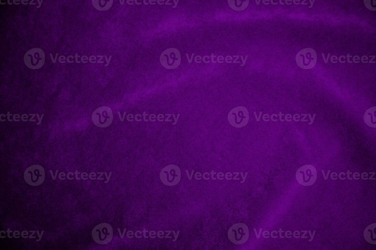 Purple velvet fabric texture used as background. Violet fabric background of soft and smooth textile material. There is space for text. photo