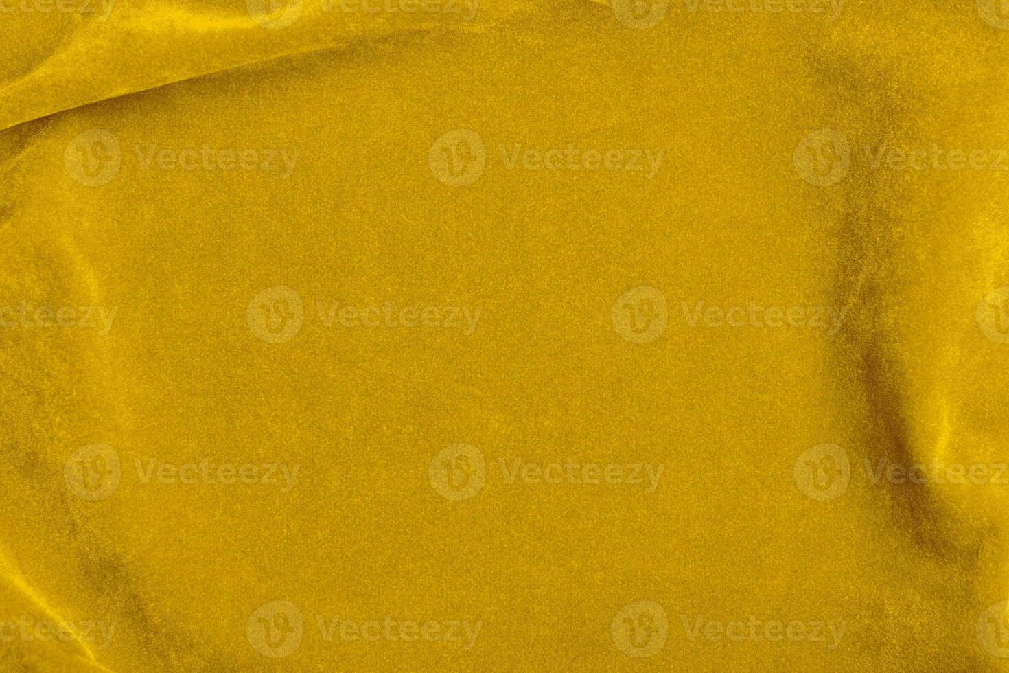 Yellow velvet fabric texture used as background. violet fabric background of soft and smooth textile material. There is space for text. photo