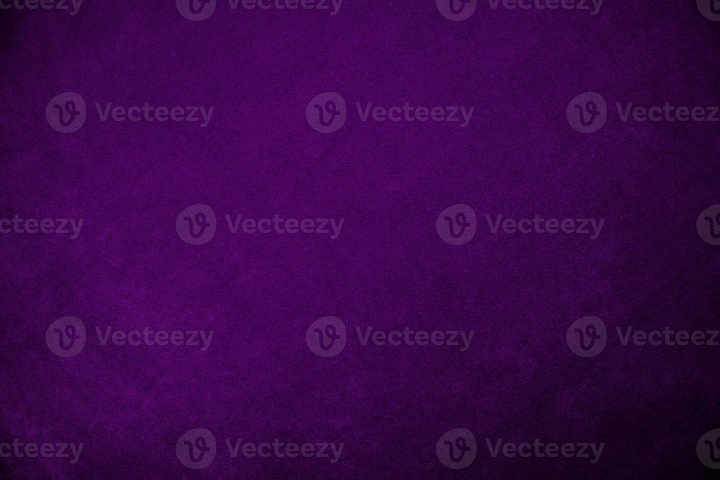 Purple velvet fabric texture used as background. Violet fabric background of soft and smooth textile material. There is space for text. photo
