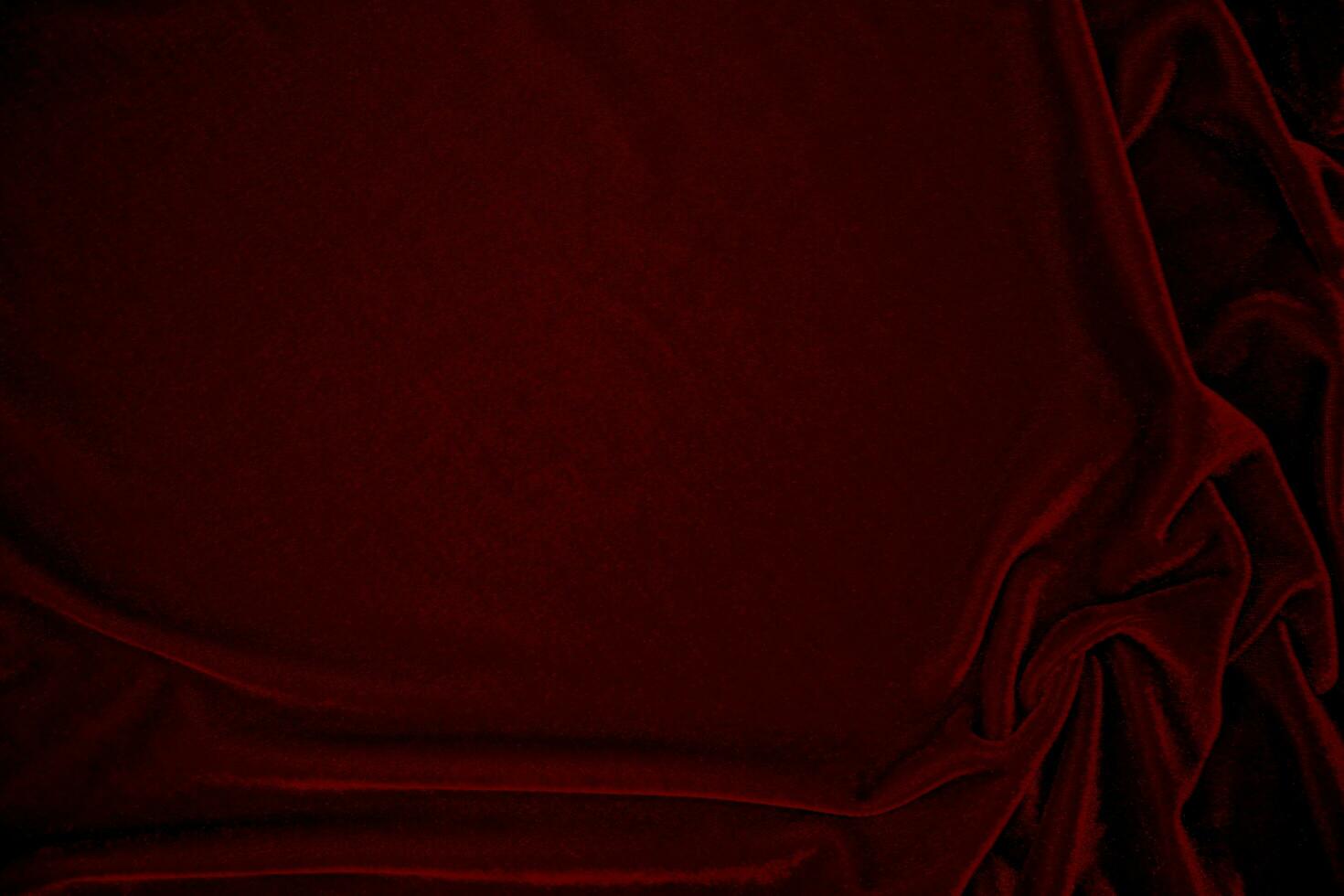 Red velvet fabric texture used as background. red panne fabric background of soft and smooth textile material. crushed velvet .luxury scarlet for silk. photo