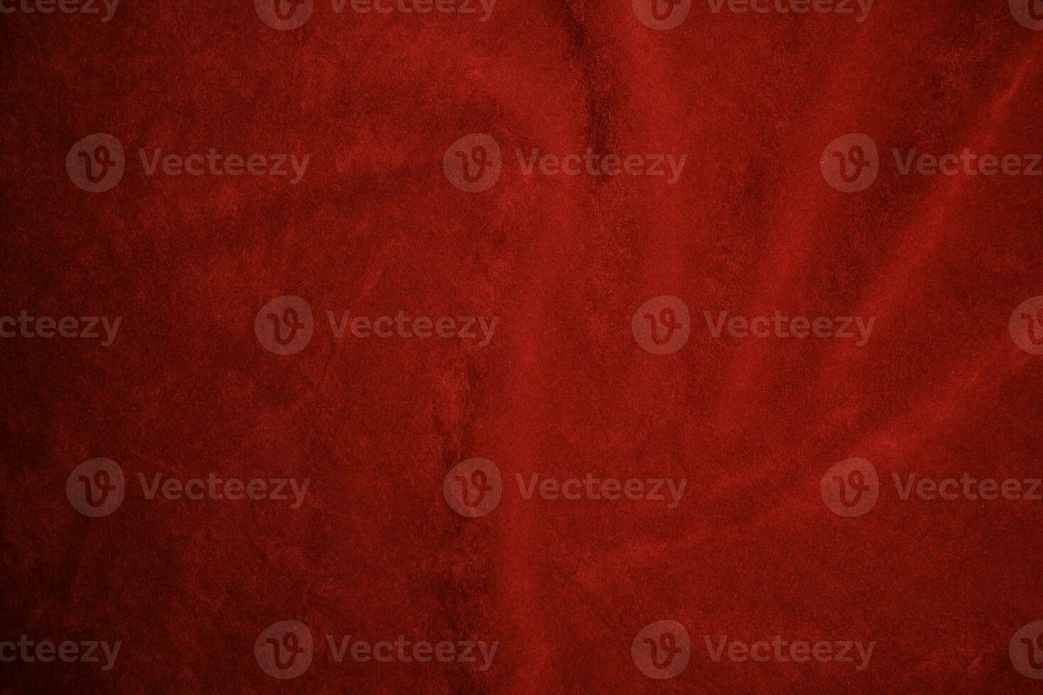 Red velvet fabric texture used as background. red fabric background of soft and smooth textile material. There is space for text.. photo