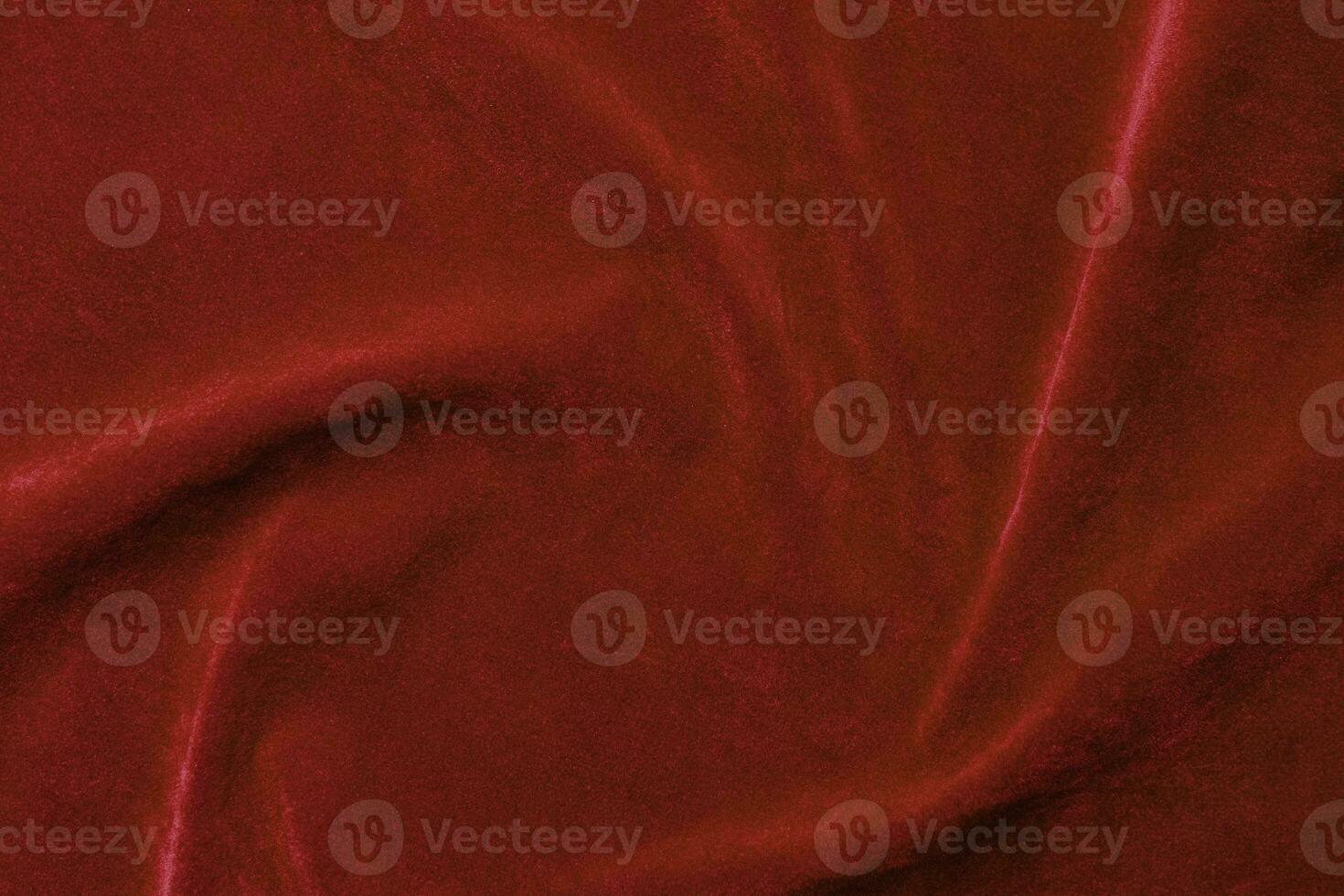 Red velvet fabric texture used as background. red fabric background of soft and smooth textile material. There is space for text. photo