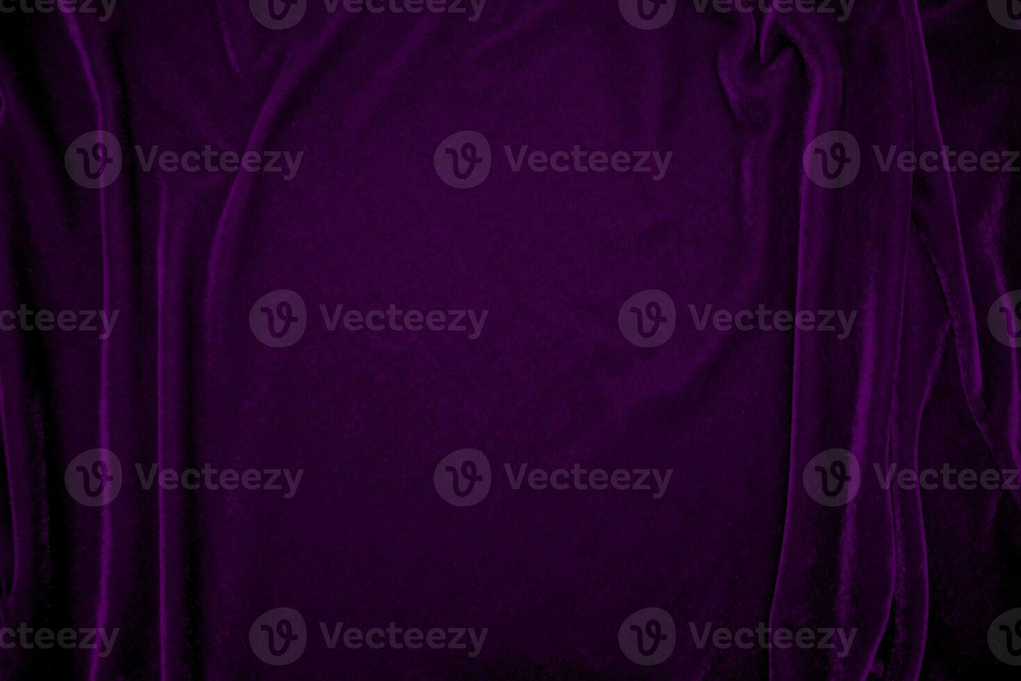 Purple velvet fabric texture used as background. Violet color panne fabric background of soft and smooth textile material. crushed velvet .luxury magenta tone for silk. photo
