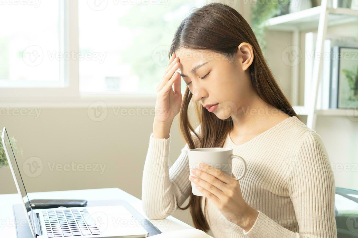 Palpitation, suffer asian young woman holding mug, drinking strong a