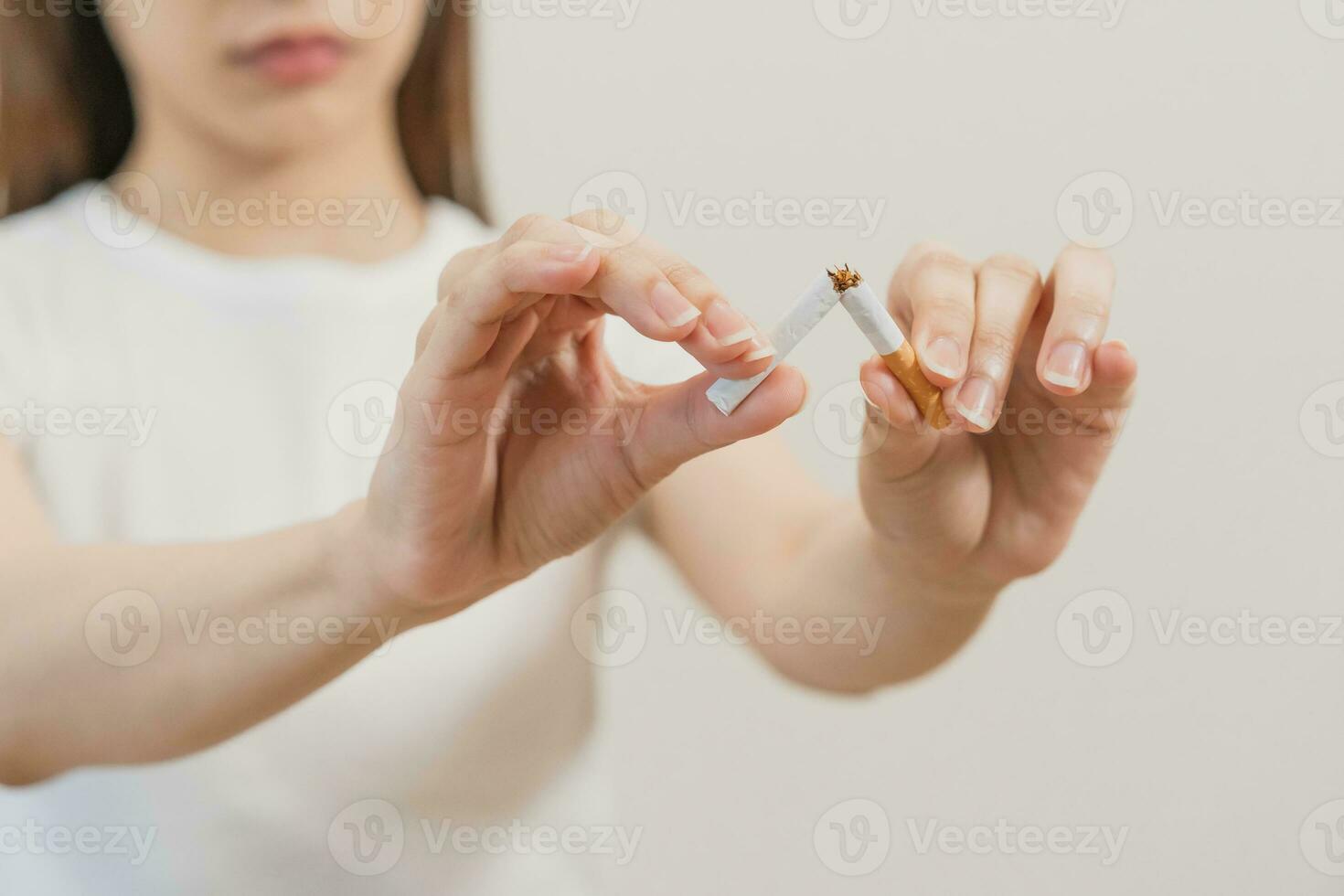 Quit, stop smoking, addiction asian young woman, girl refusing cigarette, smoker quitting smoke, hand in broken, break tobacco. Quit bad habit, health care concept. Willpower lifestyle of people. photo