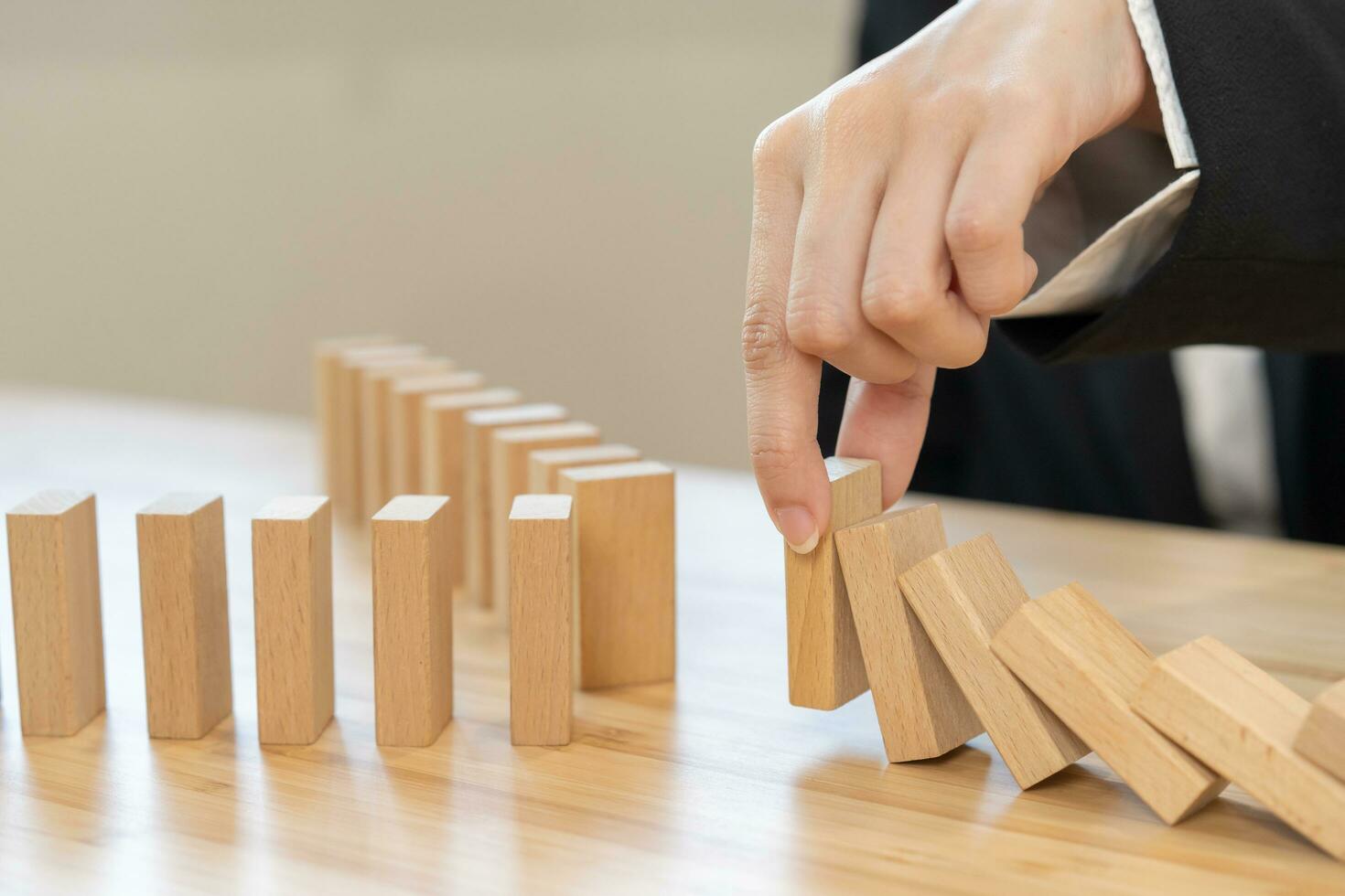 Protection finance, stopping falling block effect collapse domino wooden, Recovery risk business, Management strategy and planning before destroy. Successful intervention. photo