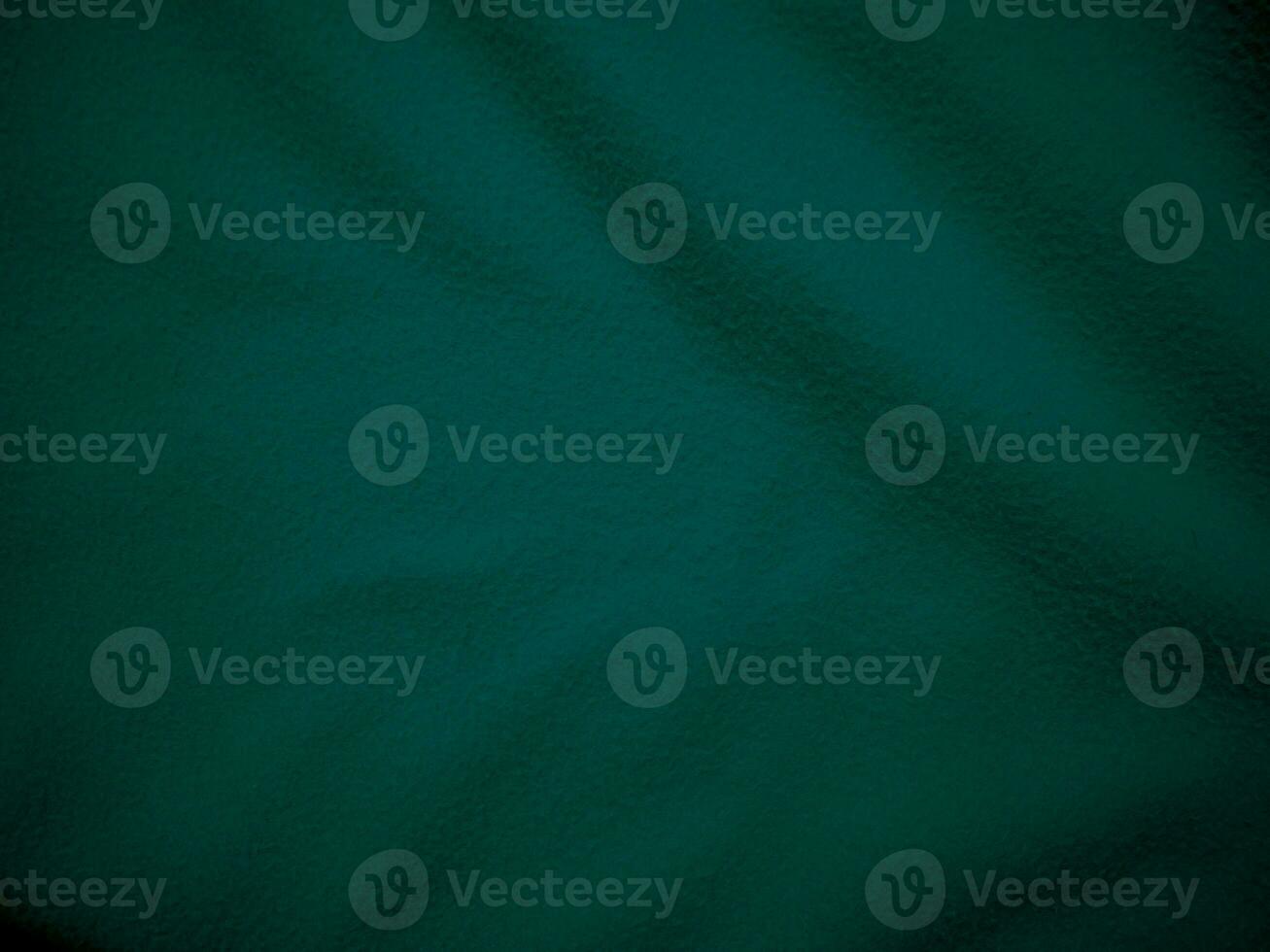 Green clean wool texture background. light natural sheep wool. serge seamless cotton. texture of fluffy fur for designers. close up fragment green flannel haircloth carpet broadcloth. photo