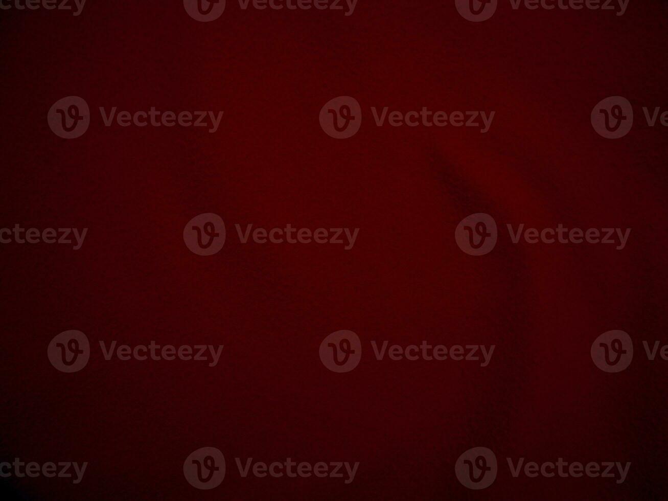 Red clean wool texture background. light natural sheep wool. serge seamless cotton. texture of fluffy fur for designers. close up fragment scarlet flannel haircloth carpet broadcloth. photo
