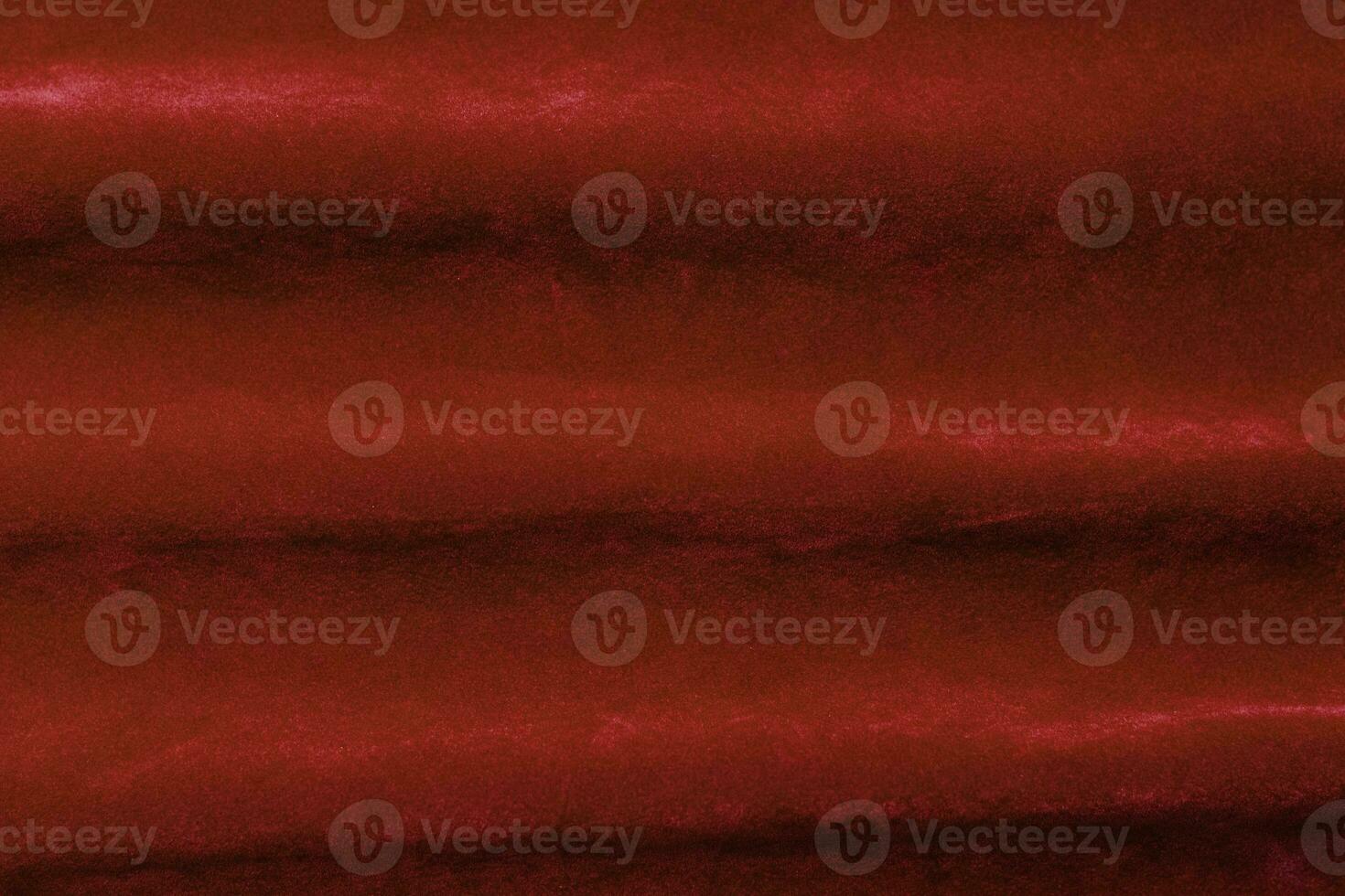 Red velvet fabric texture used as background. red fabric background of soft and smooth textile material. There is space for text. photo