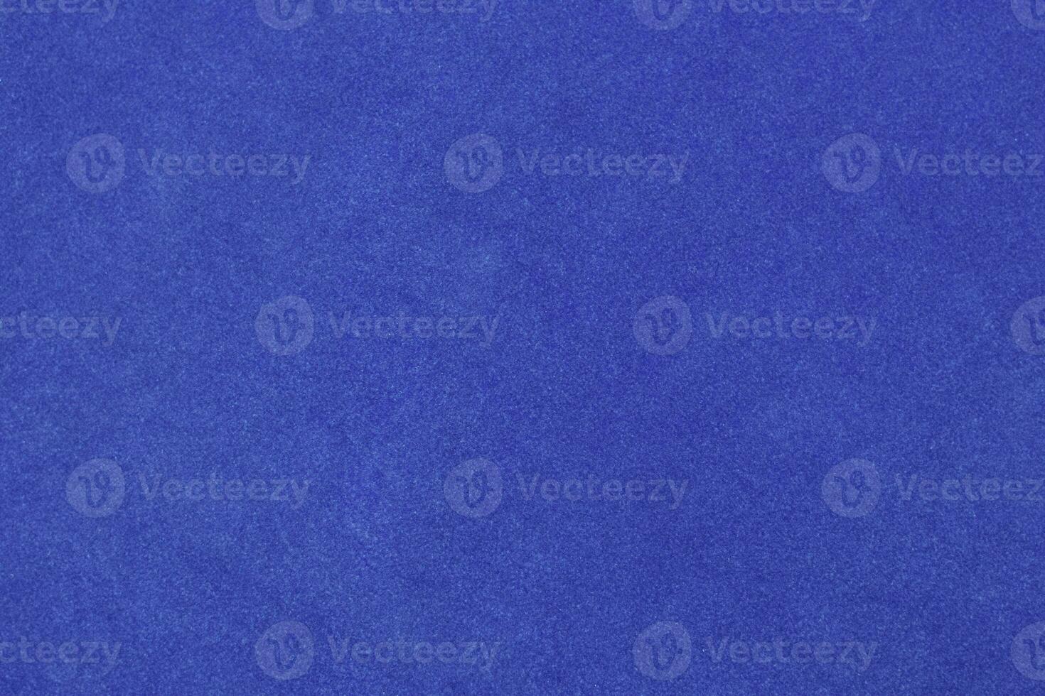 blue velvet fabric texture used as background. blue fabric background of soft and smooth textile material. There is space for text. photo