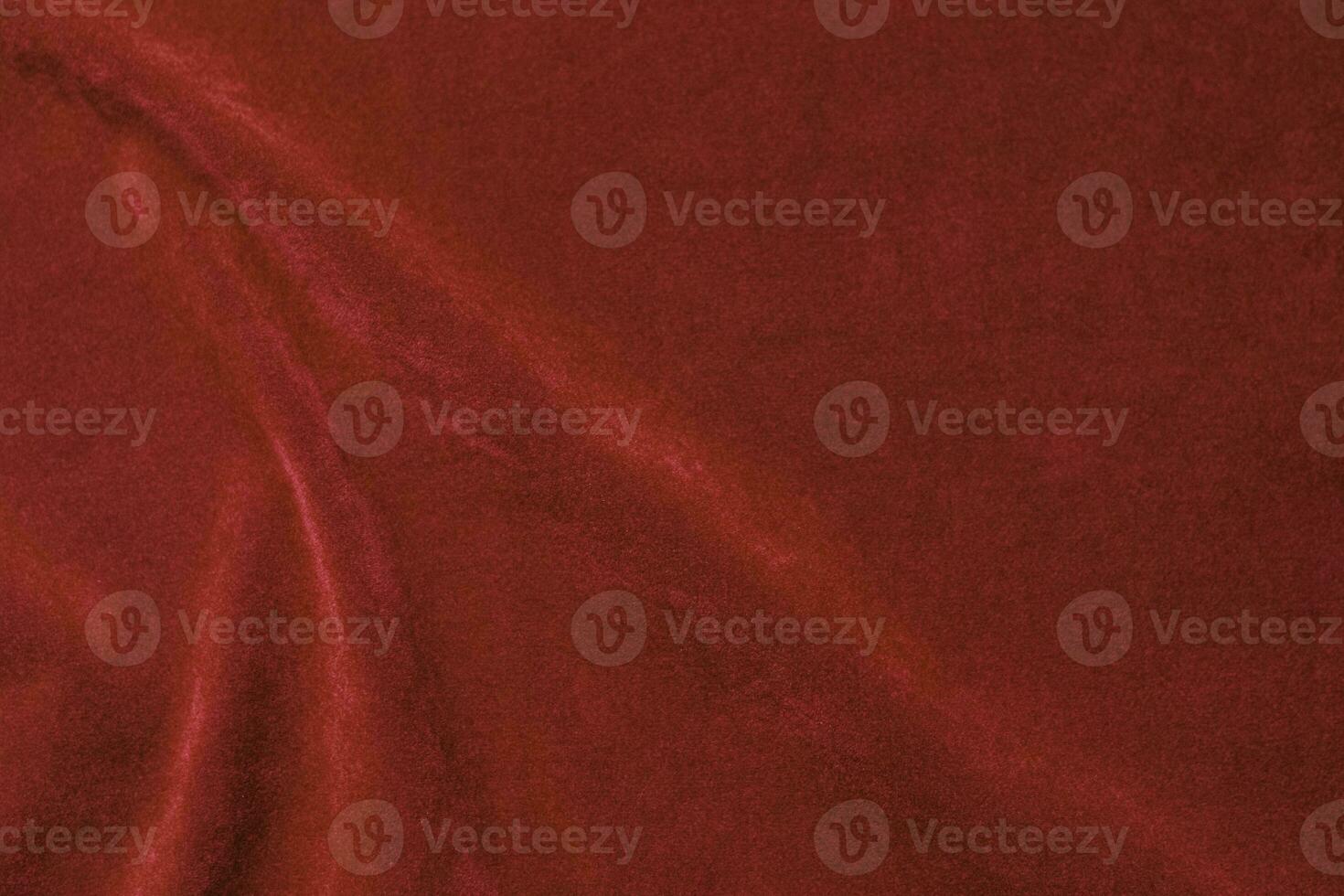 Red velvet fabric texture used as background. red fabric background of soft and smooth textile material. There is space for text. photo