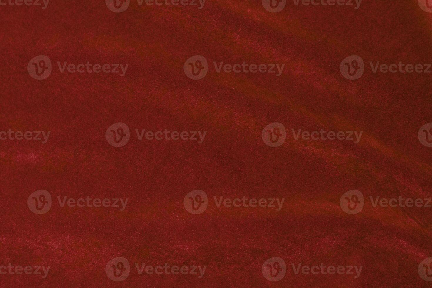 Red velvet fabric texture used as background. red fabric background of soft and smooth textile material. There is space for text. photo