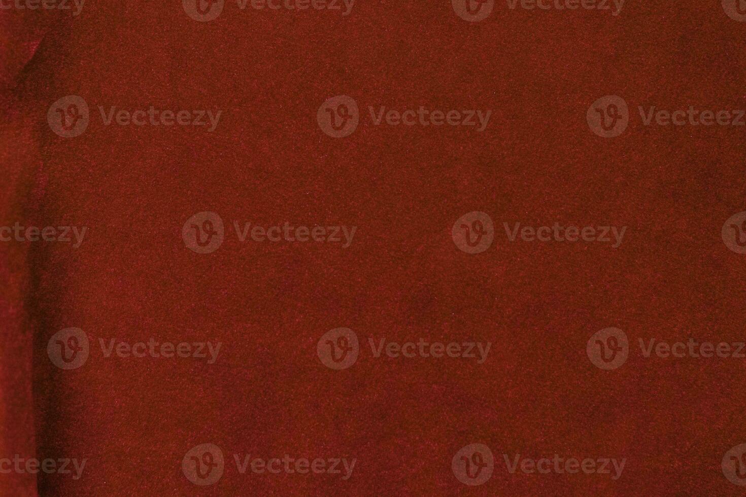 Red velvet fabric texture used as background. red fabric background of soft and smooth textile material. There is space for text. photo