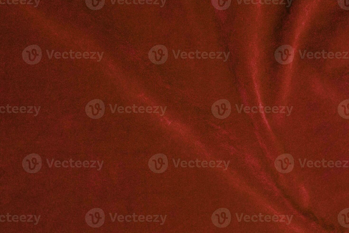 Red velvet fabric texture used as background. red fabric background of soft and smooth textile material. There is space for text. photo