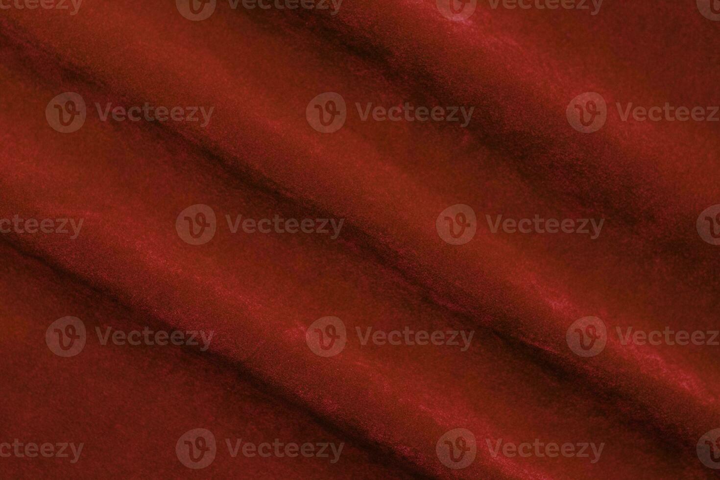Red velvet fabric texture used as background. red fabric background of soft and smooth textile material. There is space for text. photo