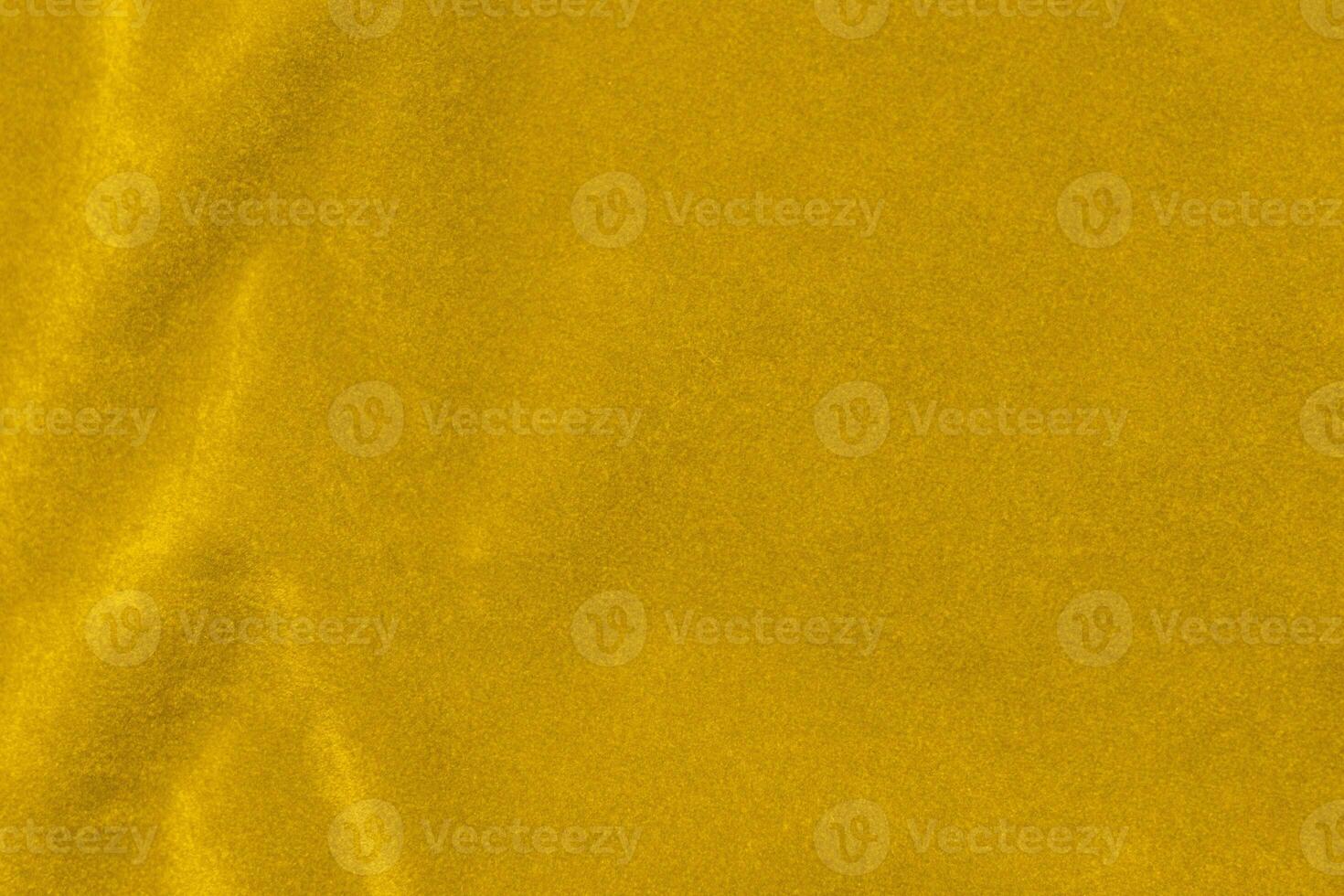 Yellow velvet fabric texture used as background. violet fabric background of soft and smooth textile material. There is space for text. photo