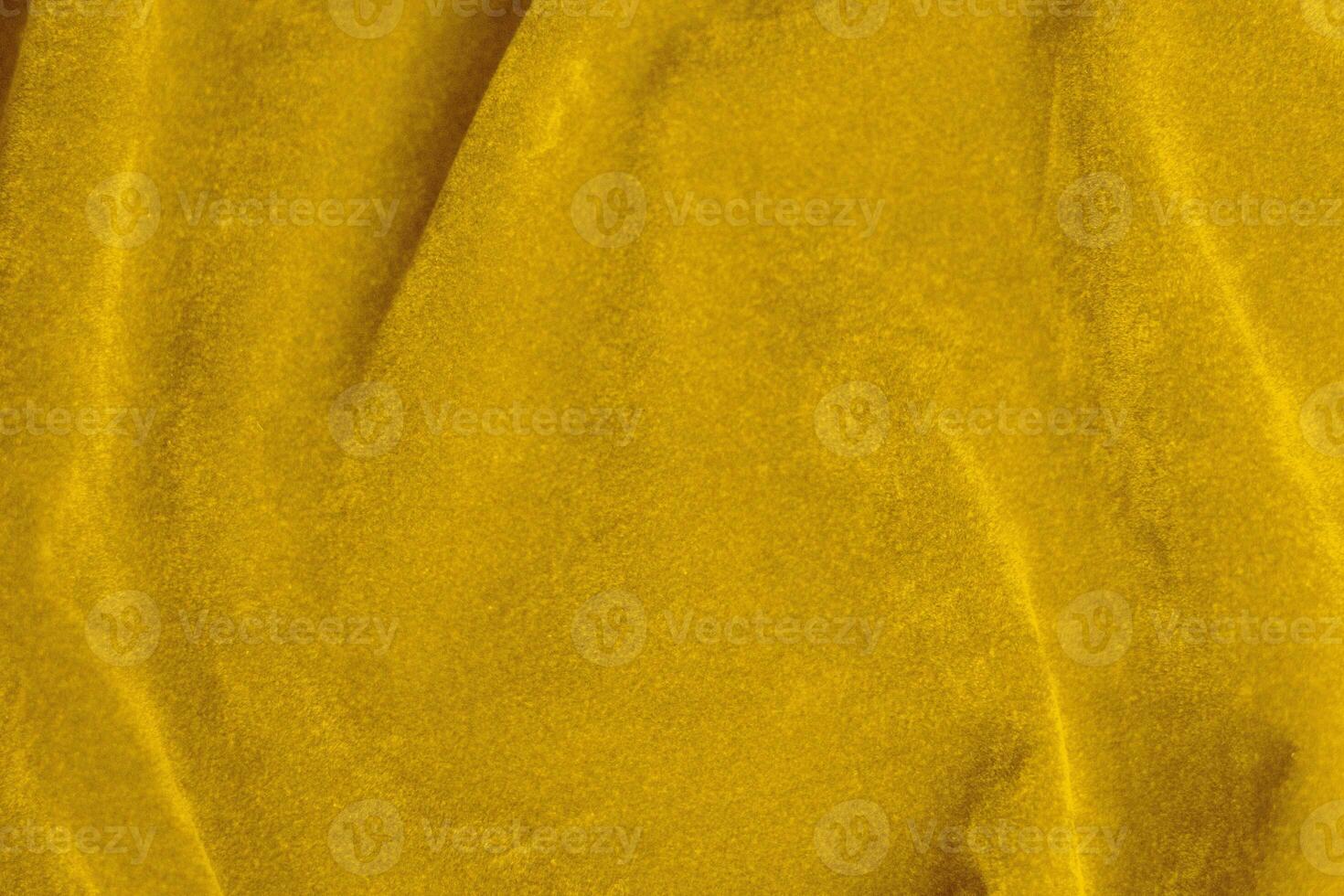 Yellow velvet fabric texture used as background. violet fabric background of soft and smooth textile material. There is space for text. photo