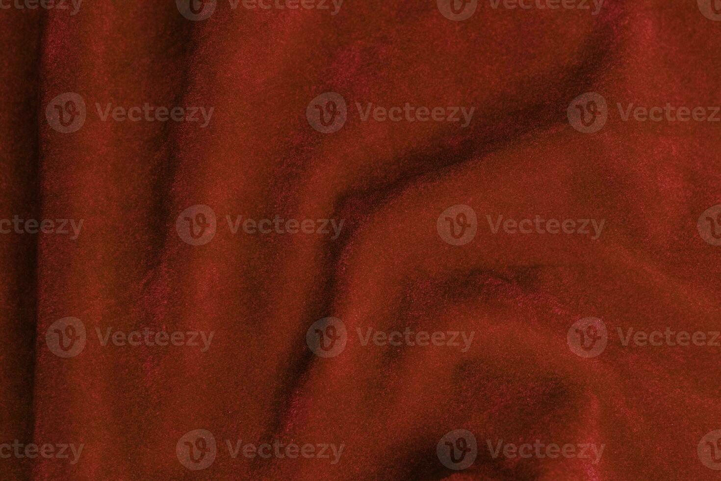 Red velvet fabric texture used as background. red fabric background of soft and smooth textile material. There is space for text. photo