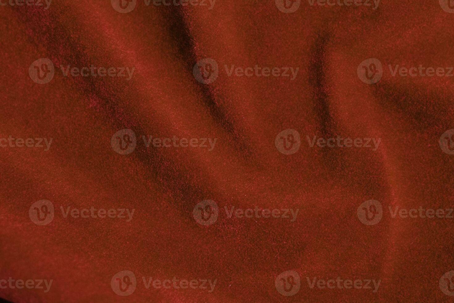 Red velvet fabric texture used as background. red fabric background of soft and smooth textile material. There is space for text. photo