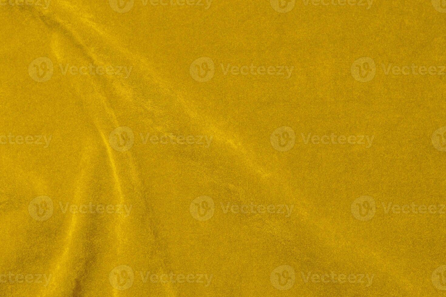 Yellow velvet fabric texture used as background. violet fabric background of soft and smooth textile material. There is space for text. photo