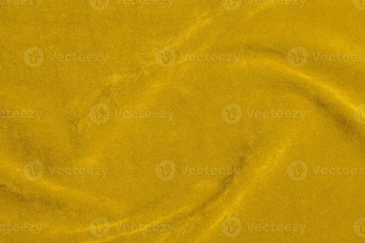 Yellow velvet fabric texture used as background. violet fabric background of soft and smooth textile material. There is space for text. photo