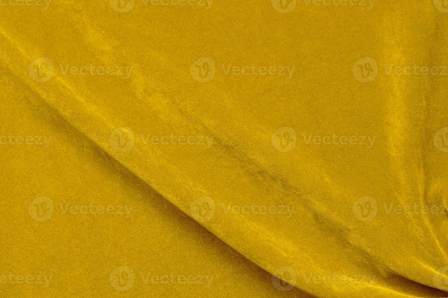 Yellow velvet fabric texture used as background. violet fabric background of soft and smooth textile material. There is space for text. photo