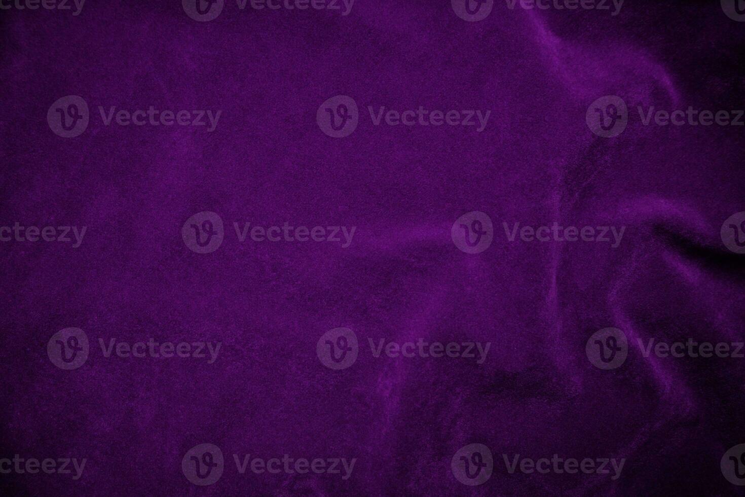 Purple velvet fabric texture used as background. Violet fabric background of soft and smooth textile material. There is space for text. photo