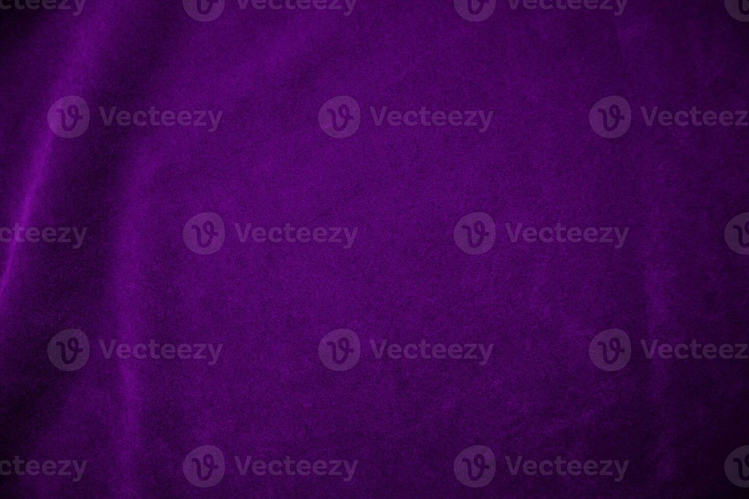 Purple velvet fabric texture used as background. Violet fabric background of soft and smooth textile material. There is space for text. photo