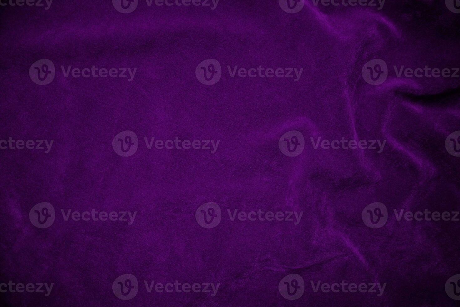 Purple velvet fabric texture used as background. Violet fabric background of soft and smooth textile material. There is space for text. photo