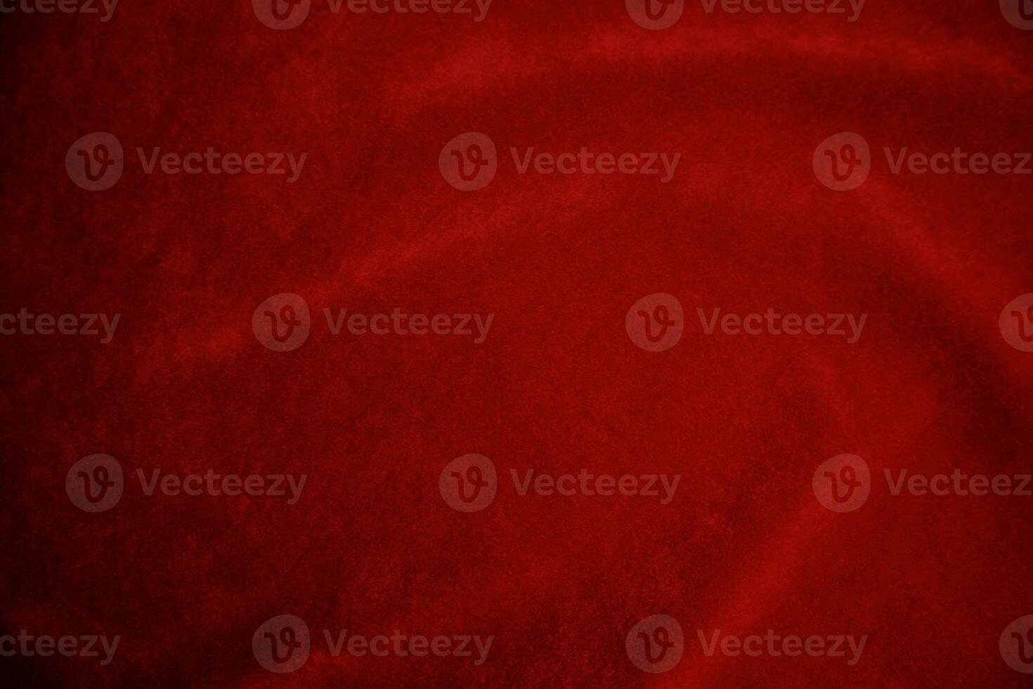 Red velvet fabric texture used as background. red fabric background of soft and smooth textile material. There is space for text.. photo