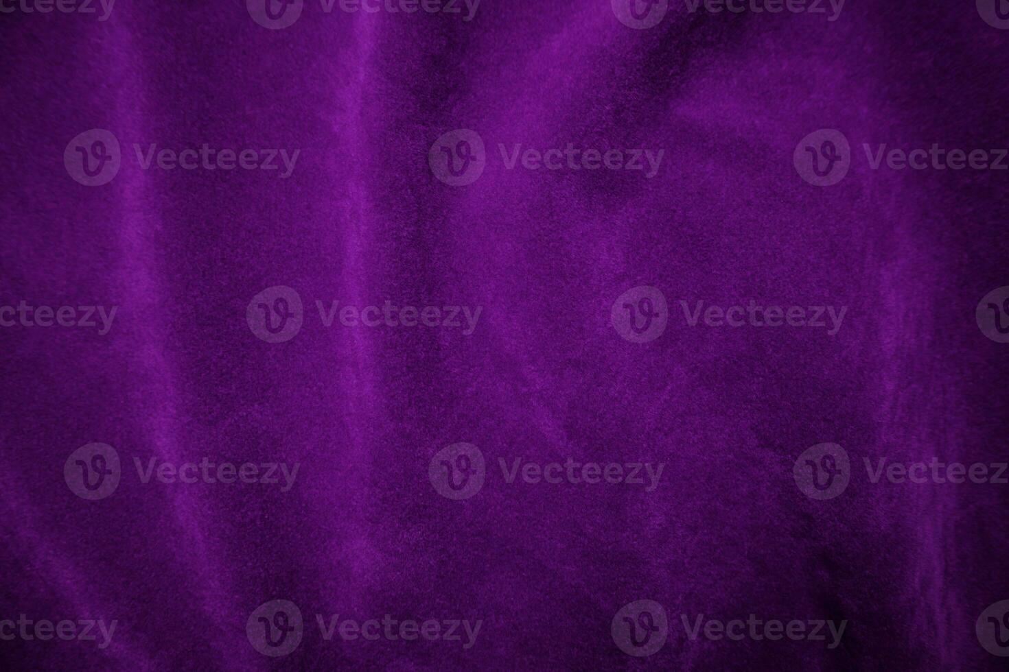 Purple velvet fabric texture used as background. Violet fabric background of soft and smooth textile material. There is space for text. photo