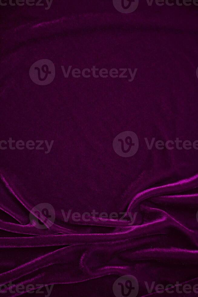 pink velvet fabric texture used as background. Wine color panne fabric background of soft and smooth textile material. crushed velvet .luxury magenta tone for silk. photo