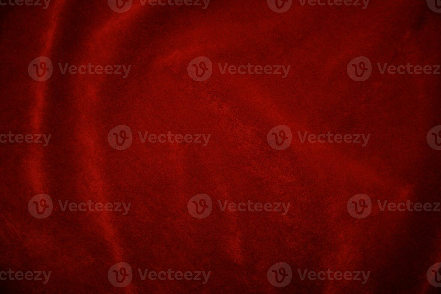 Red velvet fabric texture used as background. red fabric background of soft and smooth textile material. There is space for text.. photo