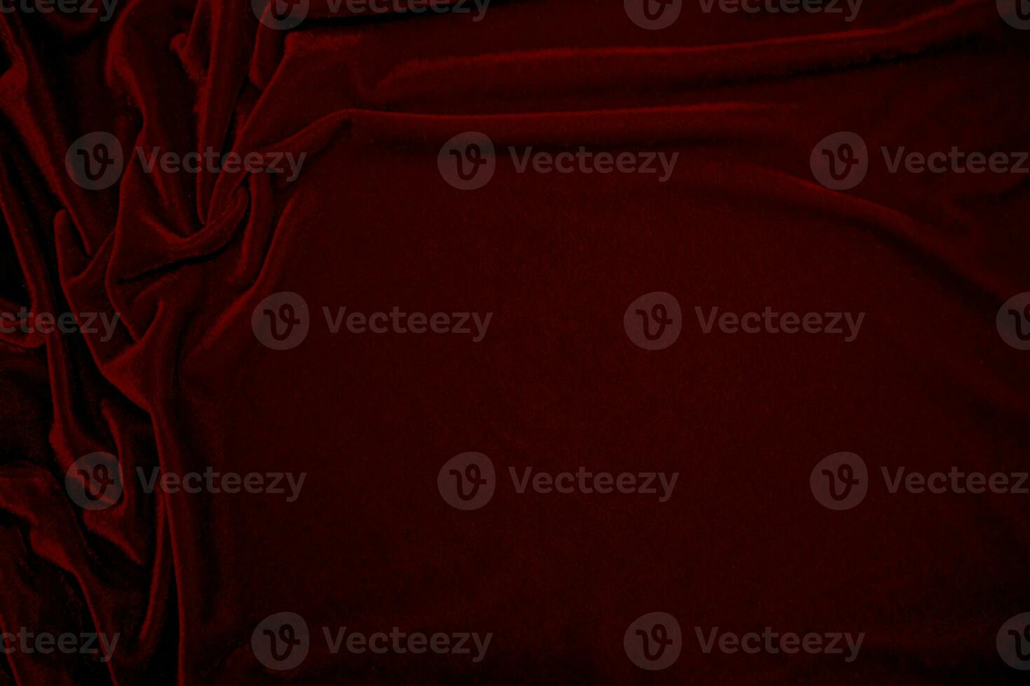Red velvet fabric texture used as background. red panne fabric background of soft and smooth textile material. crushed velvet .luxury scarlet for silk. photo