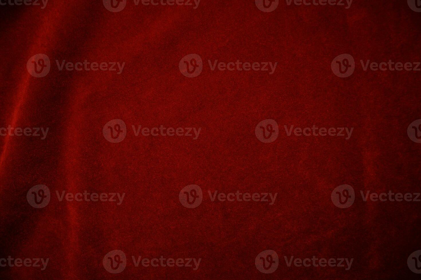 Red velvet fabric texture used as background. red fabric background of soft and smooth textile material. There is space for text.. photo