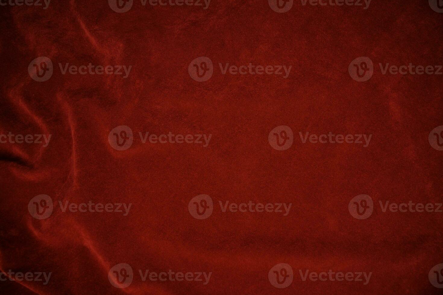 Red velvet fabric texture used as background. red fabric background of soft and smooth textile material. There is space for text.. photo