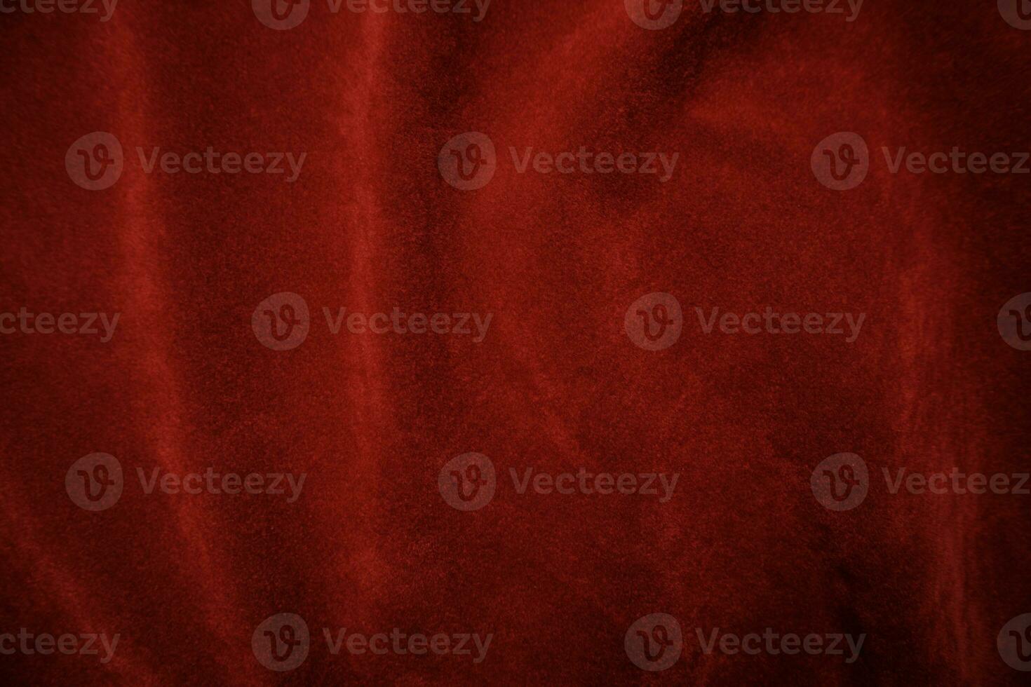 Red velvet fabric texture used as background. red fabric background of soft and smooth textile material. There is space for text.. photo
