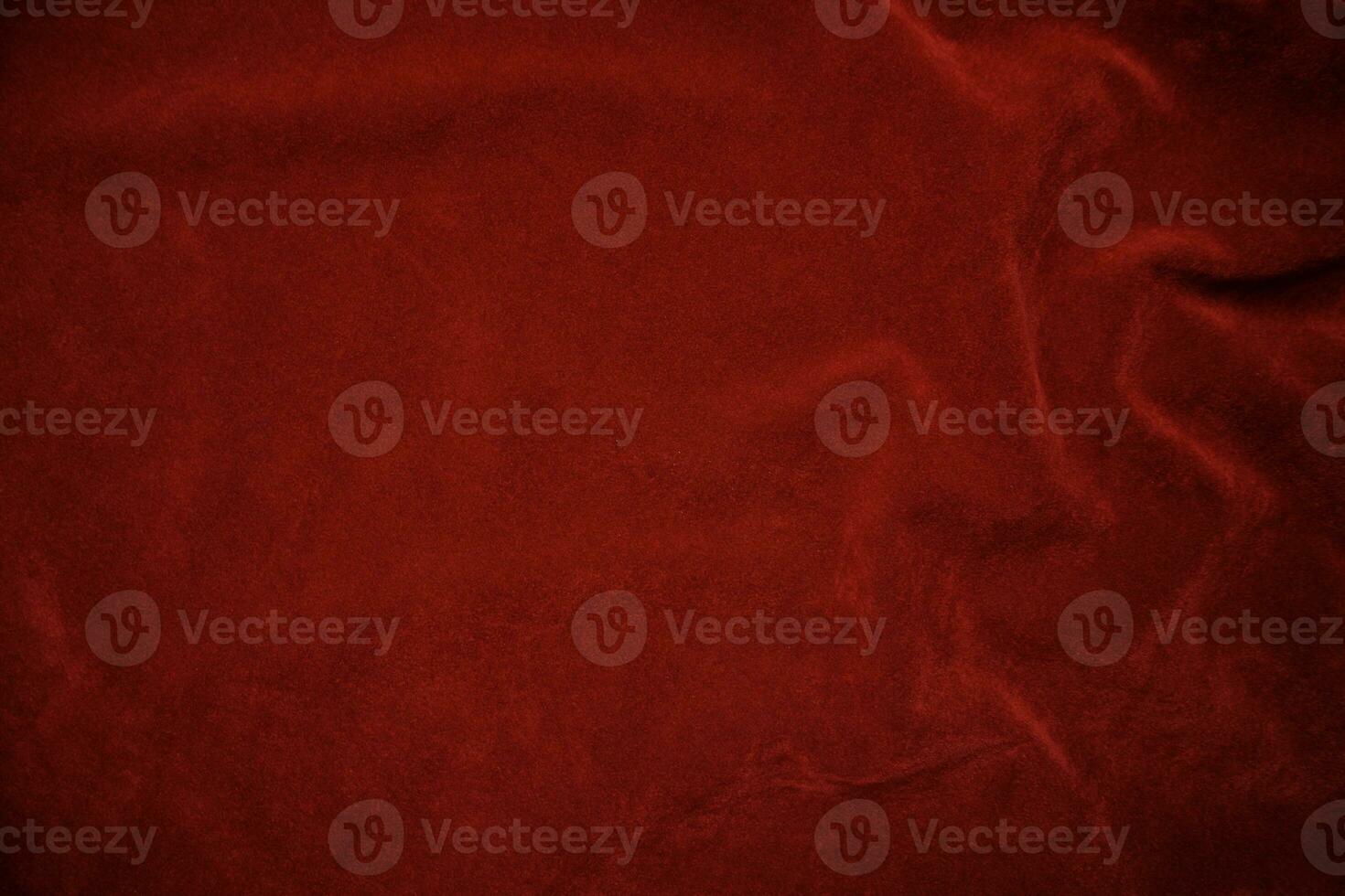 Red velvet fabric texture used as background. red fabric background of soft and smooth textile material. There is space for text.. photo