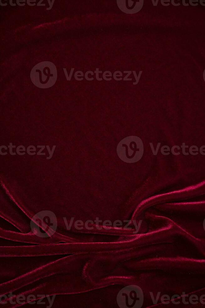 Red velvet fabric texture used as background. red panne fabric background of soft and smooth textile material. crushed velvet .luxury scarlet for silk. photo