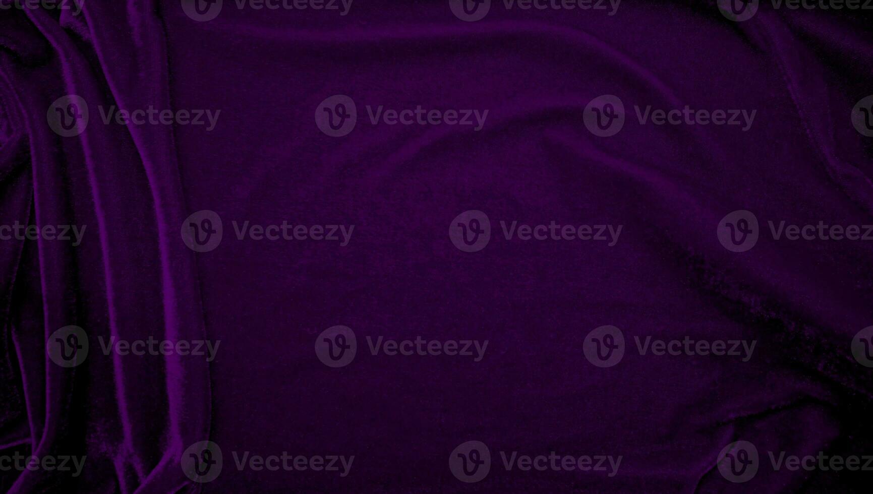 Purple velvet fabric texture used as background. Violet color panne fabric background of soft and smooth textile material. crushed velvet .luxury magenta tone for silk. photo